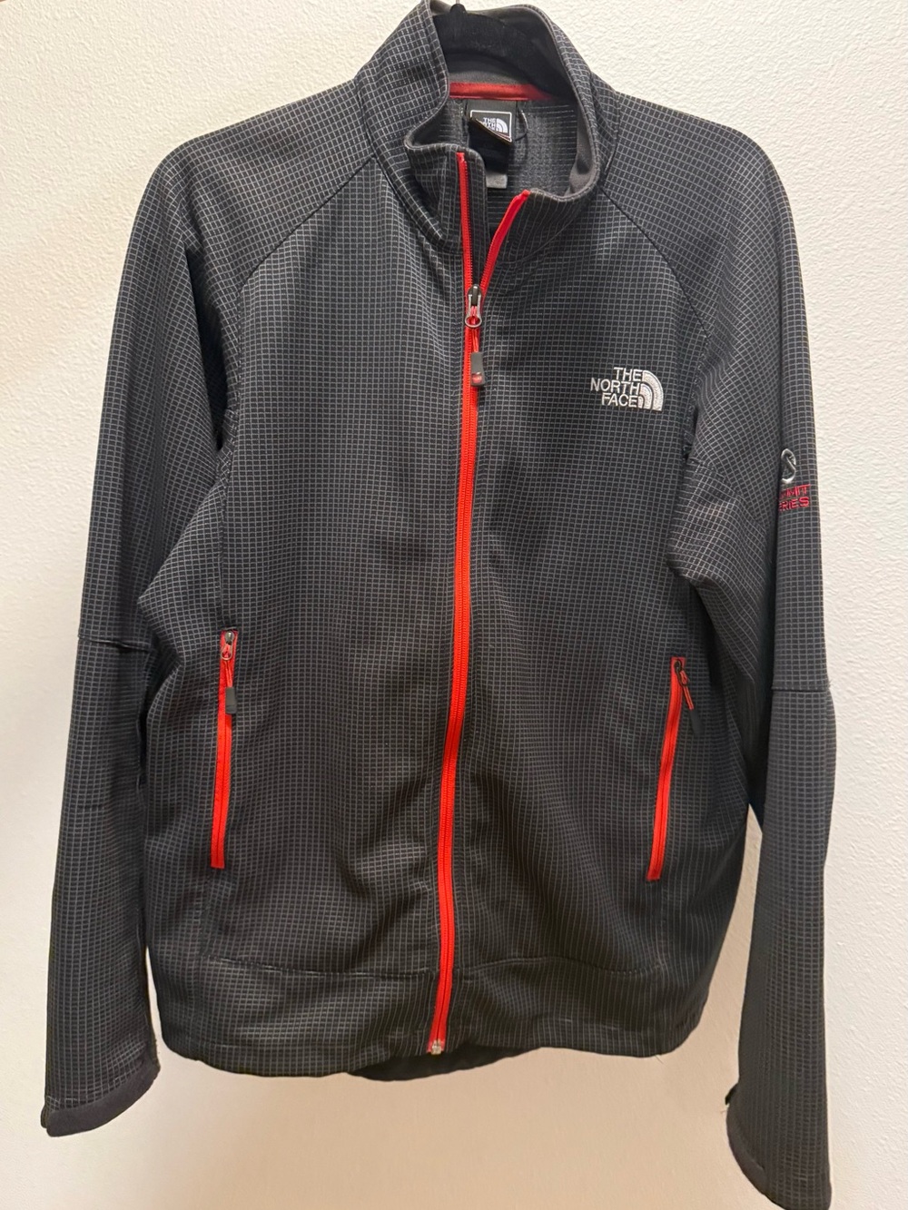 The North Face Summit Series Men's Charcoal Jacket with Red Zippers
